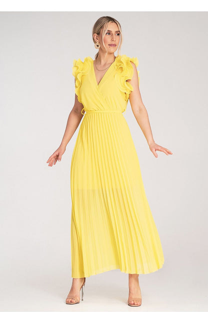 Side angle of the Figl maxi dress illustrating the exquisite design of the ruffles and the lightweight fabric movement.