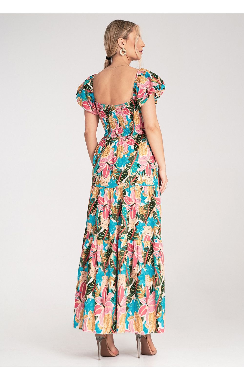 Elegantly designed Figl maxi dress showcasing a flared skirt, square neckline and puffy sleeves, perfect for chic occasions.