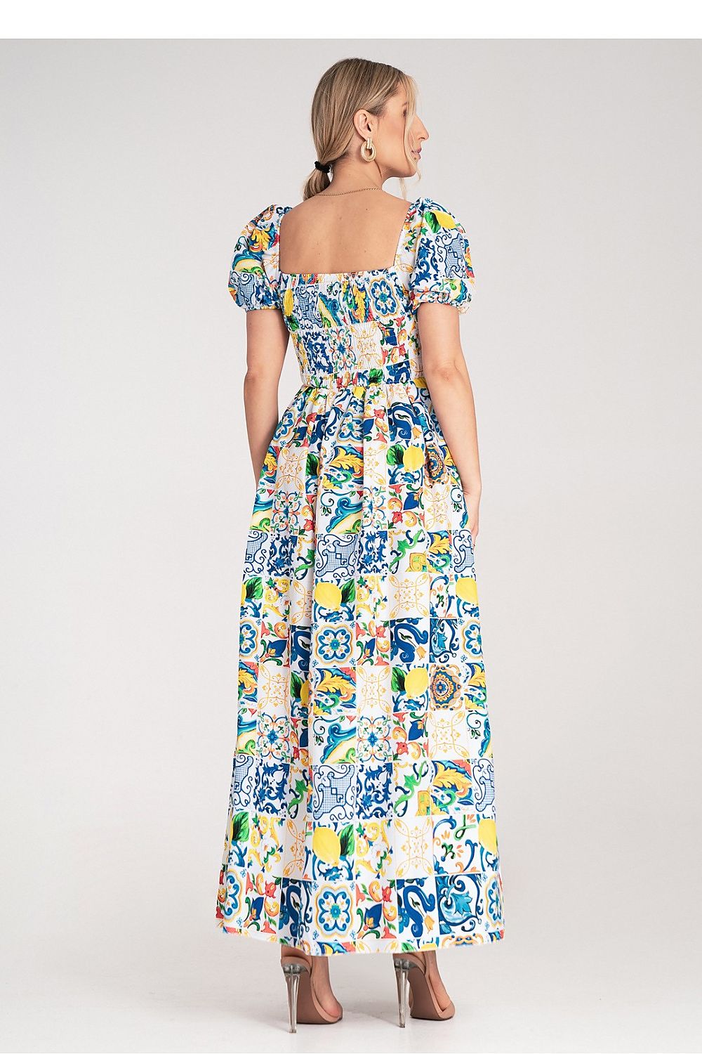 Stylish Figl maxi dress in EU S/M, highlighting intricate colourful tile patterns, cinched at the waist for a flattering silhouette.