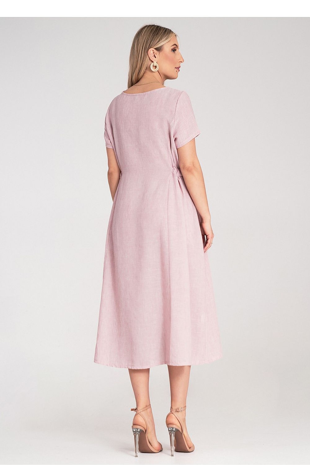 Beautifully designed Figl midi dress in EU size 0, featuring subtle texture and a gracefully flowing silhouette that exudes elegance.