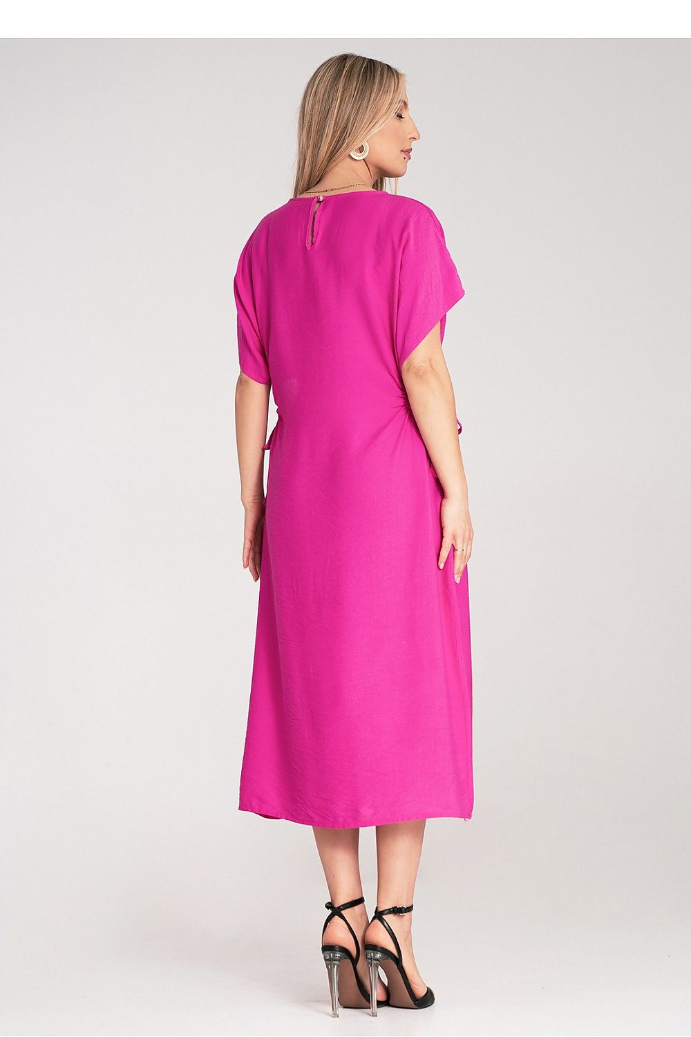 Stylish luxury Figl midi dress displaying exquisite craftsmanship and unique cut-out features, available in size EU 0.