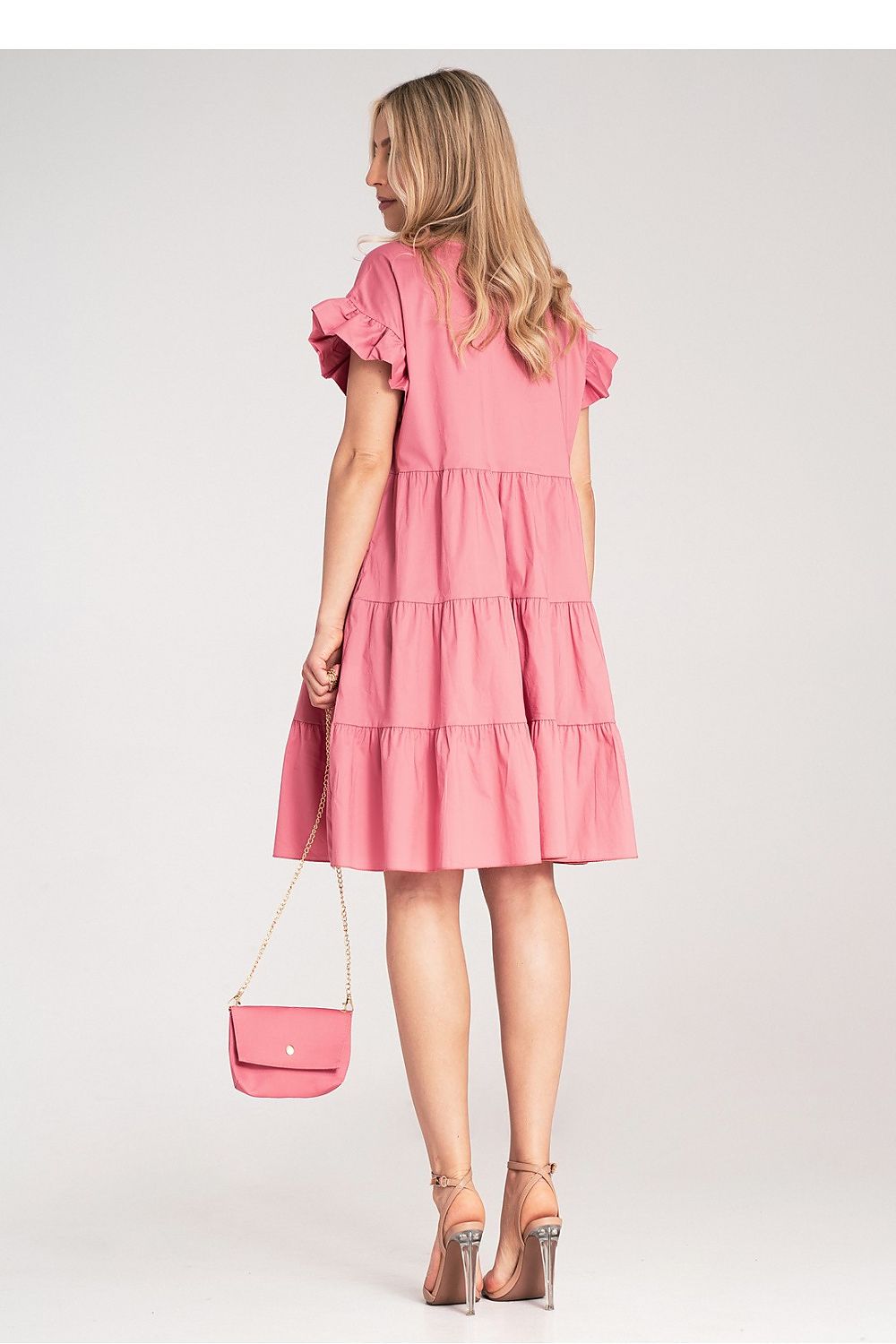 Flared bottom of Figl Mini Ruffle Daydress, designed with horizontal cuts for added volume, ideal for a stylish and comfortable look.