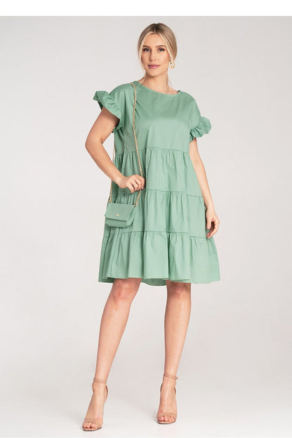 Fashion-forward look at Figl's Mini Ruffle Daydress in cotton, ideal for casual elegance, featuring a relaxed silhouette and comfortable fit.