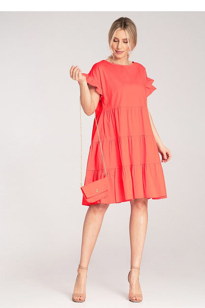 Elegant Figl Mini Ruffle Daydress in light cotton, showcasing a loose fit and short sleeves with decorative ruffles, perfect for sophisticated summer style.