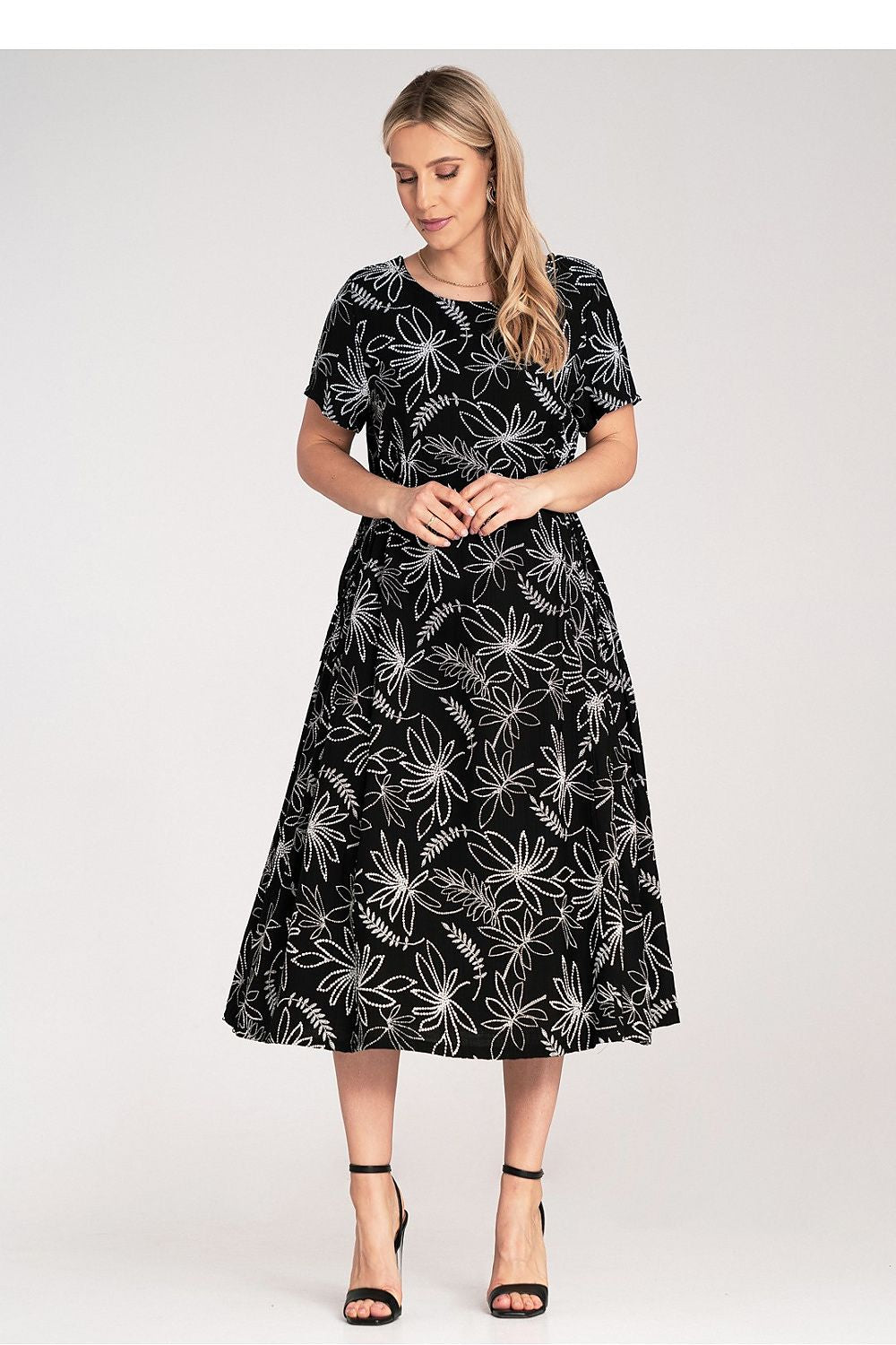 Elegant Figl midi dress with an embossed floral pattern and side pockets, crafted from premium fabrics, designed to complement various body silhouettes in EU size 0.