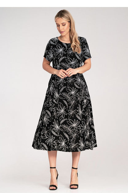 Elegant Figl midi dress with an embossed floral pattern and side pockets, crafted from premium fabrics, designed to complement various body silhouettes in EU size 0.