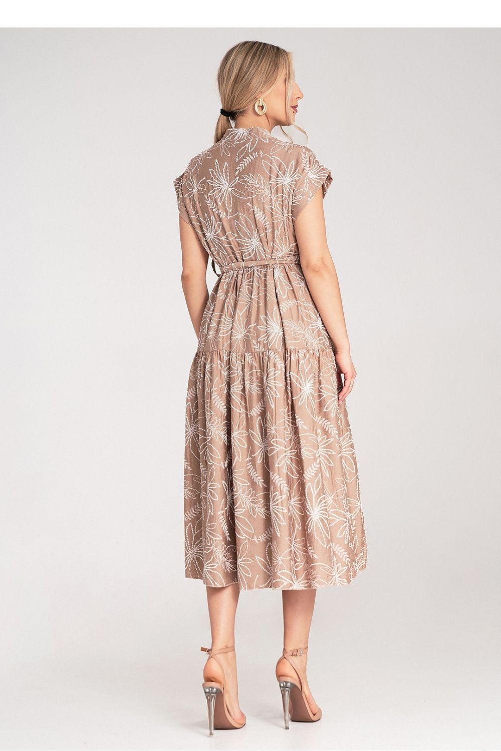 Close-up view of the Figl Midi Dress showcasing its embossed floral print and luxurious material.