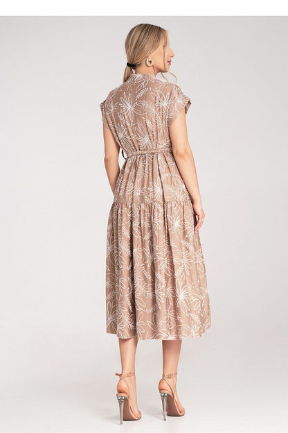 Close-up view of the Figl Midi Dress showcasing its embossed floral print and luxurious material.