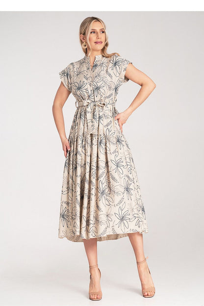 Model wearing the Figl Floral Midi Dress, exuding sophistication and style with its elegant design.