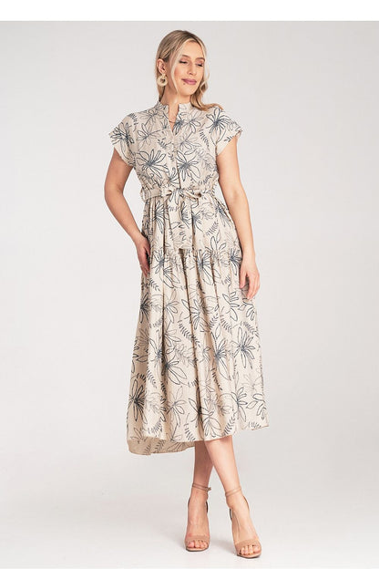 Flat lay of the Figl Midi Dress displaying its high-quality fabric and intricate floral motif.