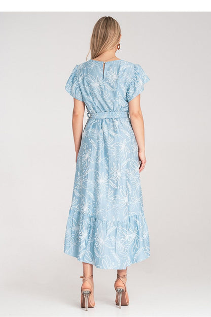 Detailed look at the floral pattern of the Figl midi dress, emphasising the intricate embossed design and flowing ruffle sleeves.