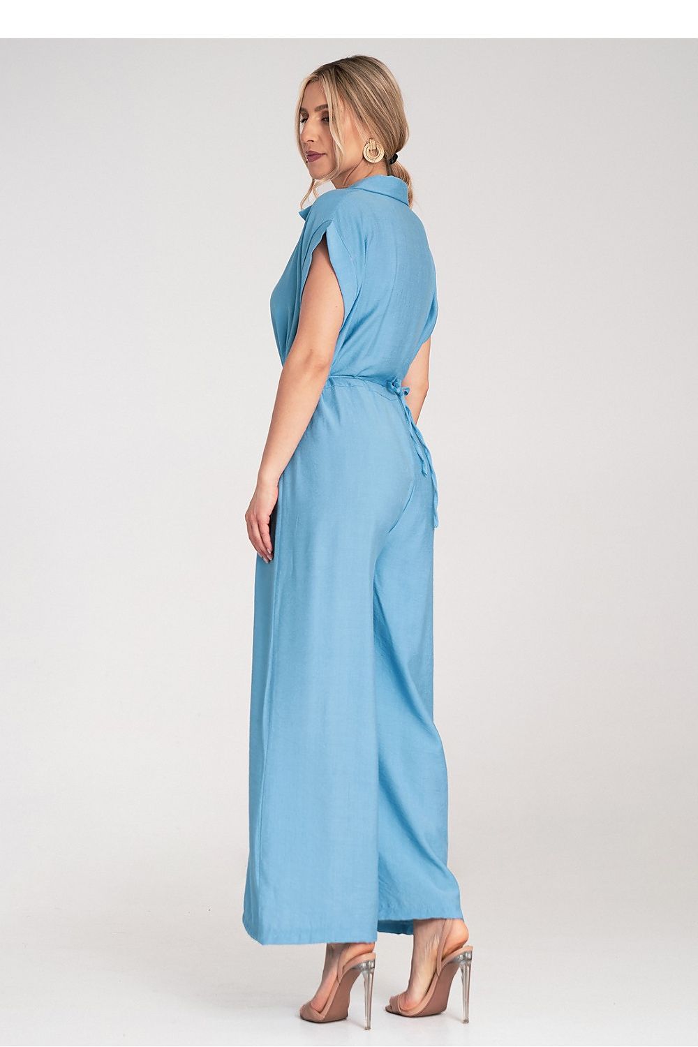 Intricate floral application on the waist of the Figl Wide-Leg Jumpsuit, highlighting the fine craftsmanship and luxurious details of the design.