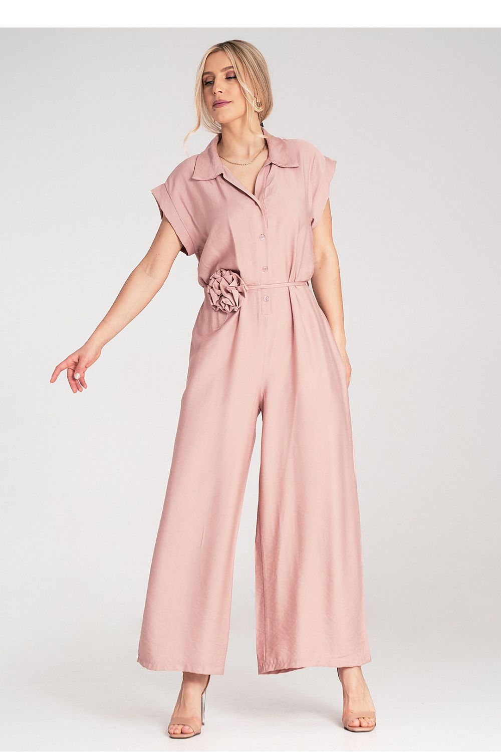 Full view of Figl Floral Detail Wide-Leg Jumpsuit in a chic setting, highlighting its loose fit and lightweight material perfect for all occasions.
