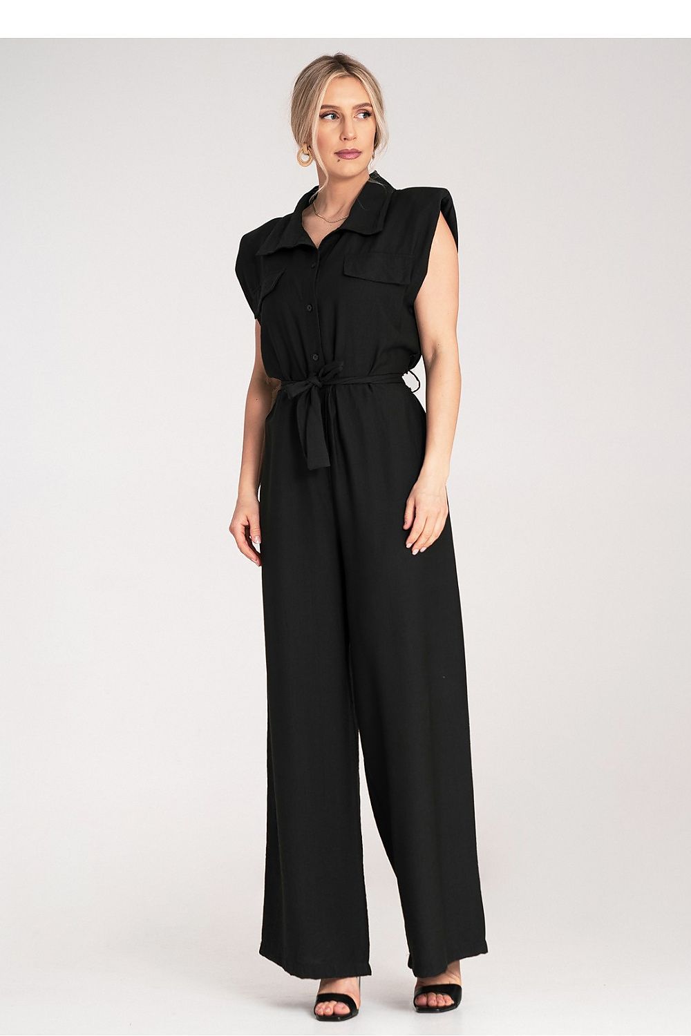 Stylish Figl jumpsuit with sleeveless design, intricate button fastening, and decorative chest flaps, perfect for luxury fashion lovers.