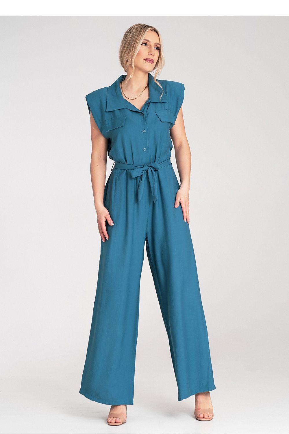 Chic Figl jumpsuit showcasing padded shoulders and a stylish collar design, perfect for sophisticated occasions, EU Size 0.
