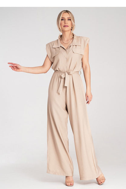 Close-up view of the Figl jumpsuit's padded shoulder detailing, enhancing its luxurious design and providing a structured fit.