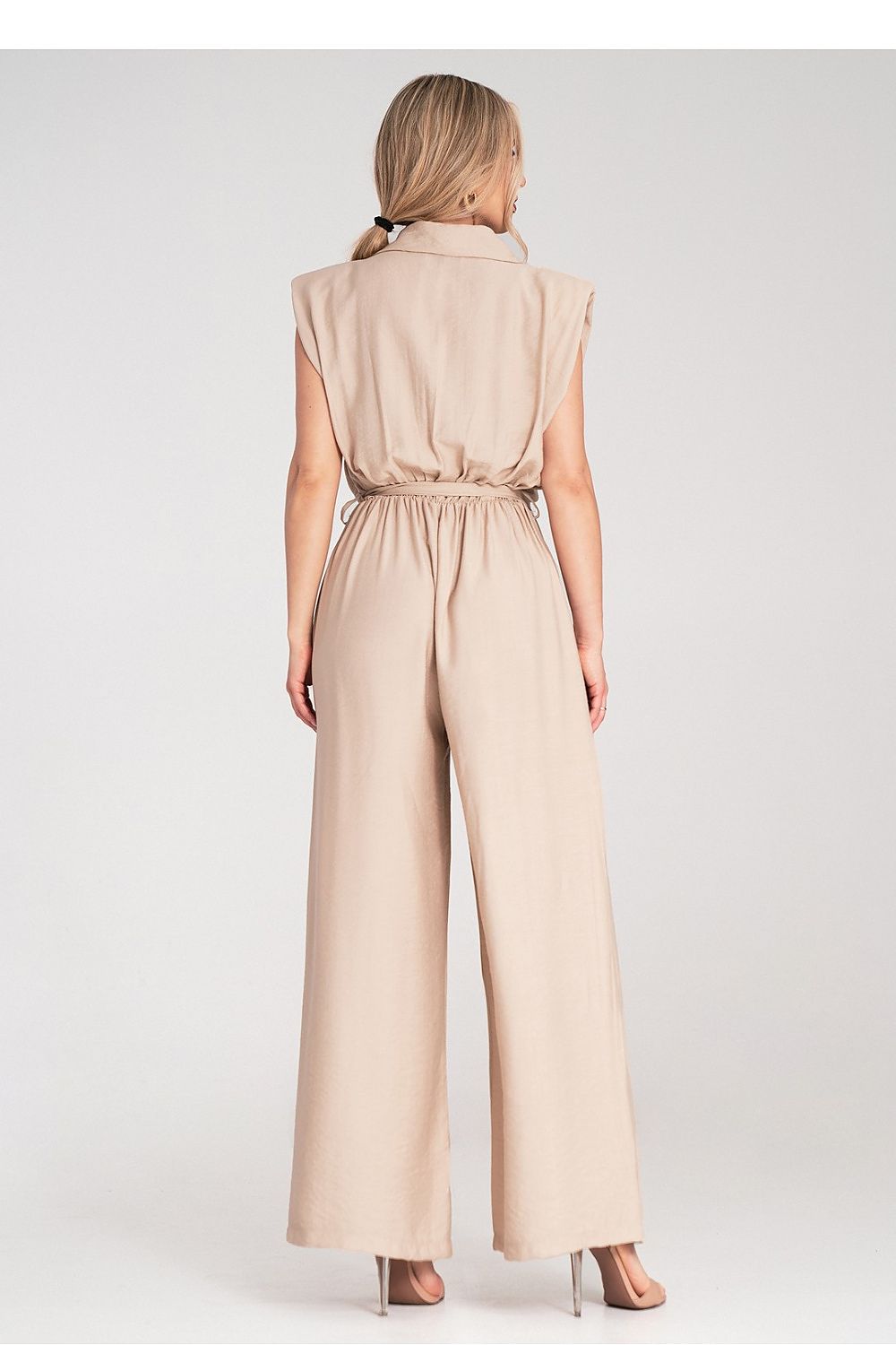 Stylish Figl jumpsuit styled with decorative chest flaps, perfect for a chic and fashionable look at any upscale event.