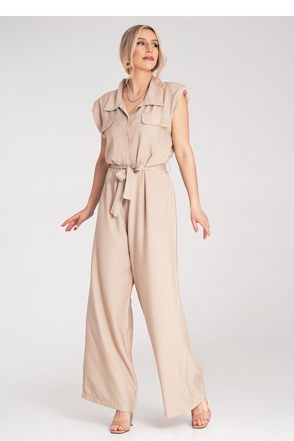Model wearing the luxurious Figl jumpsuit with wide legs, demonstrating its breathable fabric and tailored fit, ideal for confident styling.