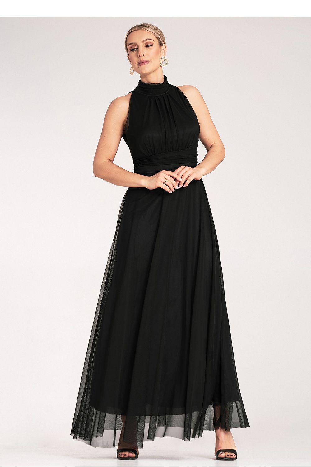 Full-length view of Luxury Figl Maxi Halter Neck Cocktail Dress accentuating its flowing silhouette and charming details.