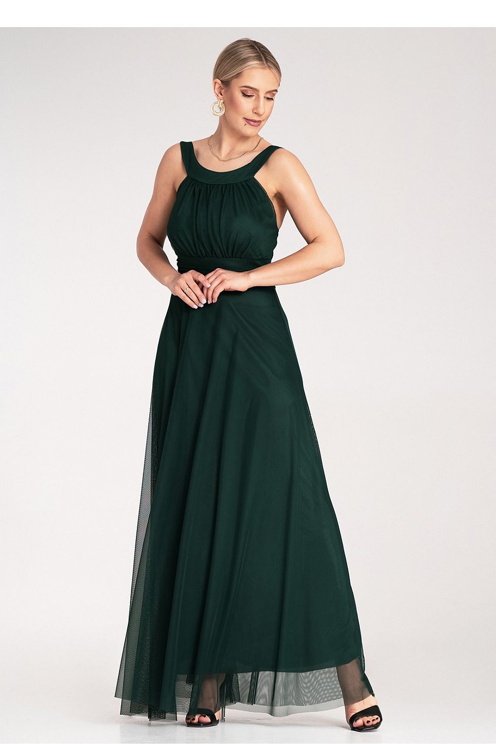 Elegant maxi dress by Figl, featuring light flowing material and a ruched waistband, perfect for sophisticated occasions. Available in sizes EU S/M and US S/M.