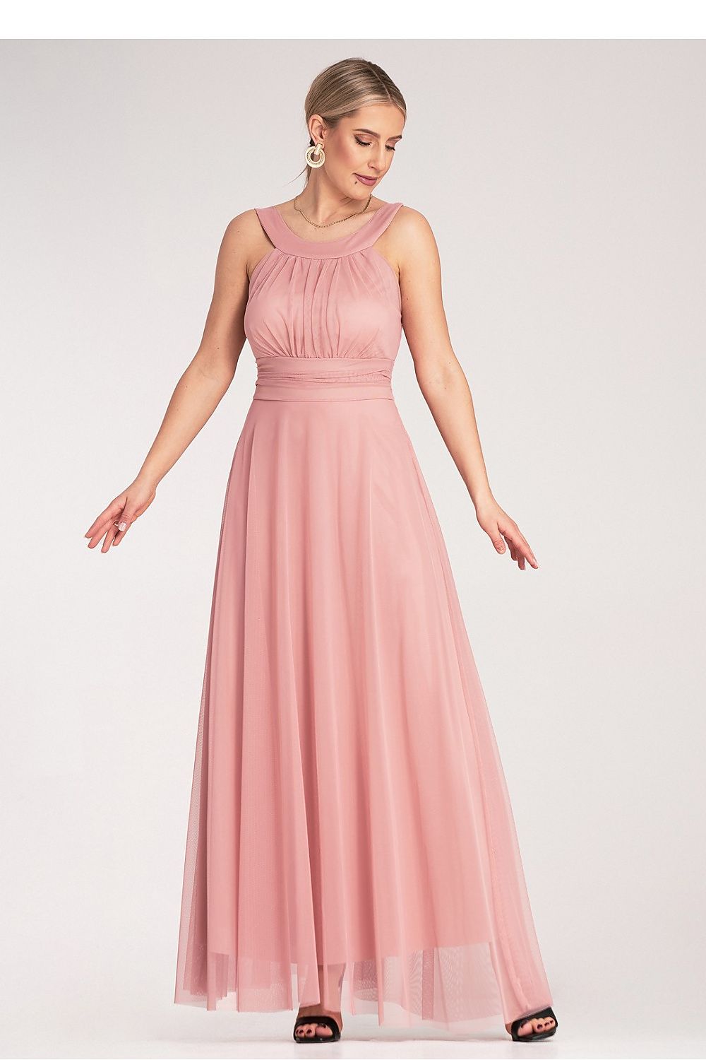 Elegant maxi dress by Figl displayed on a mannequin, emphasizing its light and airy material perfect for summer events.