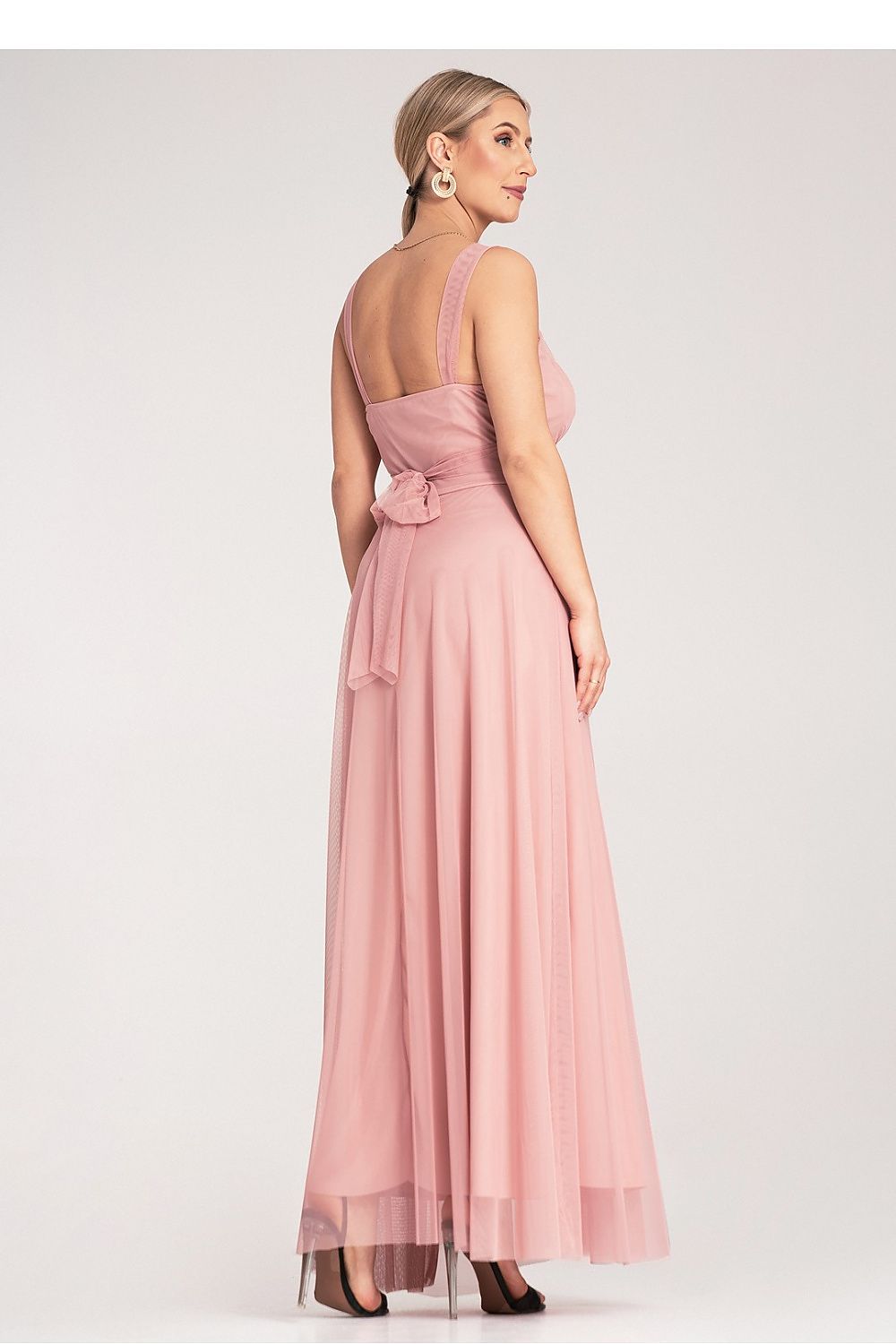 Back view of the Figl elegant maxi dress, illustrating the beautiful drape and attention to detail in its design.