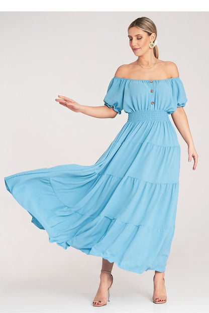 Stylish flared design of the Figl luxury summer maxi dress, highlighting the beautiful gathers on the bust and decorative buttons.