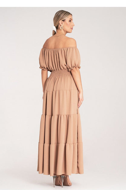 Detailed close-up of Figl's luxury summer maxi dress showcasing decorative buttons and gathers on the bust.