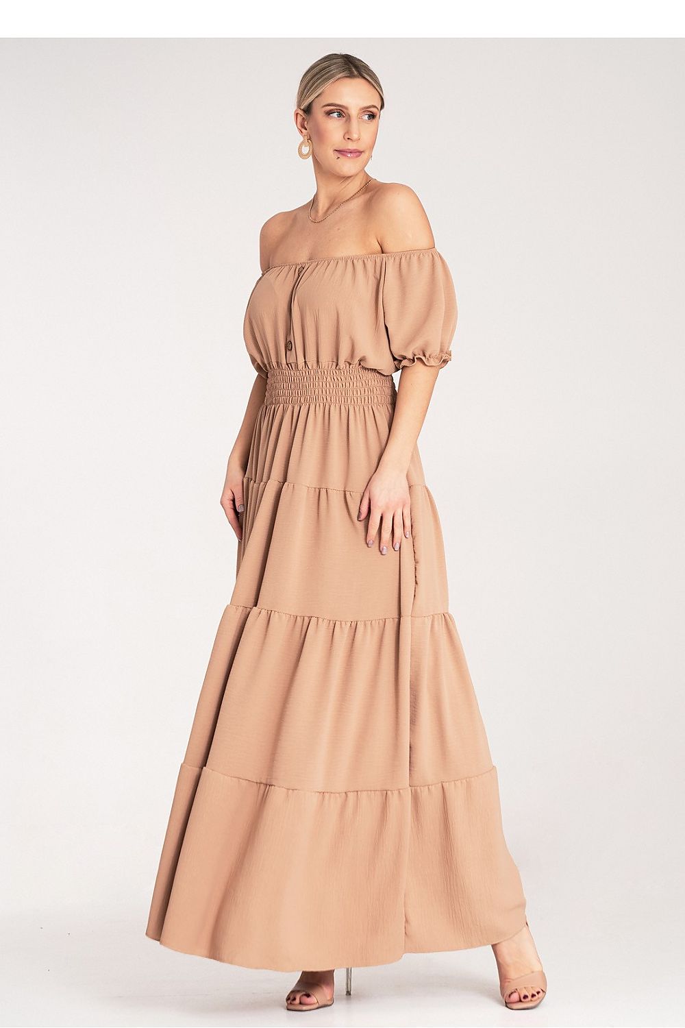Back view of the stylish flared summer maxi dress by Figl, highlighting the elastic waist and layered design.