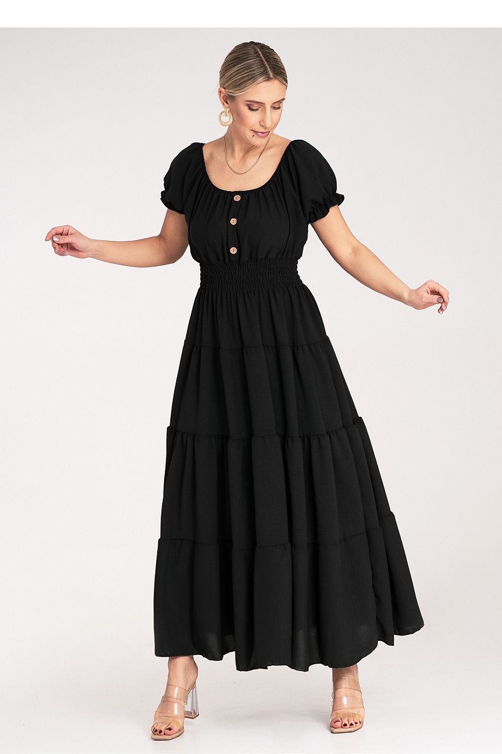 Model wearing Figl's chic summer maxi dress with puff sleeves, effortlessly styled for a luxurious summer look.