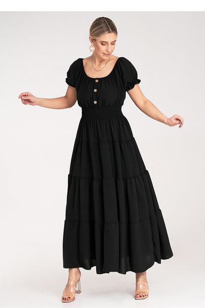 Model wearing Figl's chic summer maxi dress with puff sleeves, effortlessly styled for a luxurious summer look.