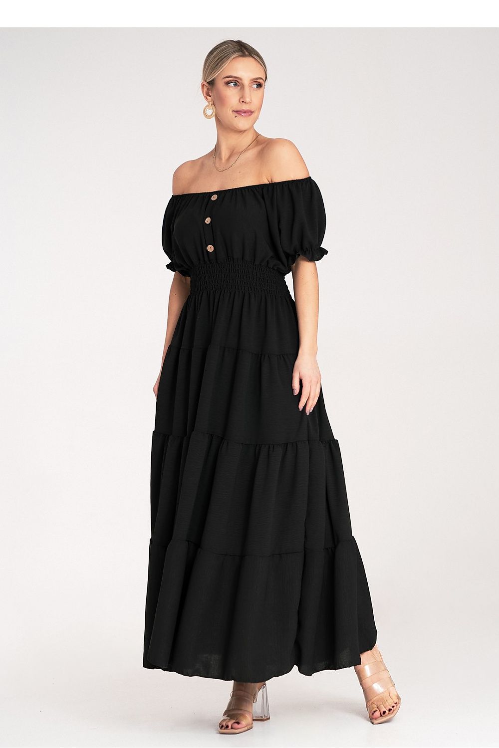 Full-length display of a luxury summer maxi dress from Figl, demonstrating its flattering silhouette and elegant fabric.