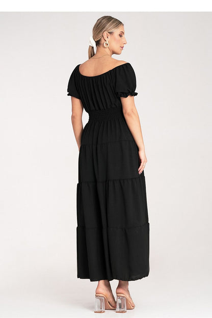 Luxury summer maxi dress by Figl featuring a Spanish neckline and elegant puff sleeves, perfect for stylish summer outings.