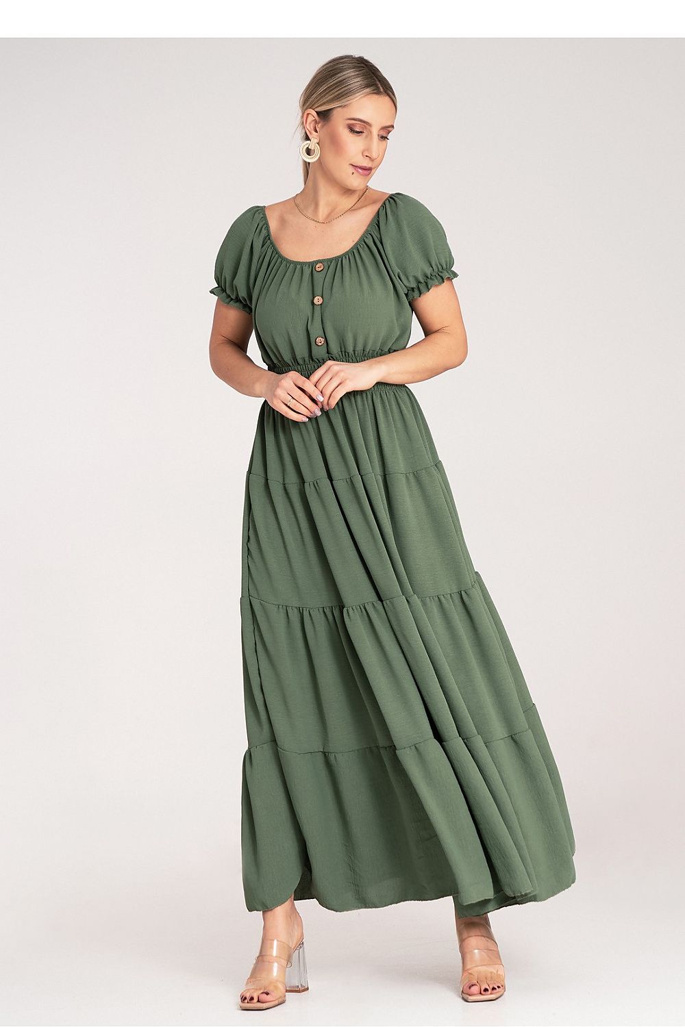 Close-up of the Spanish neckline and puff sleeves of the luxury maxi dress by Figl, emphasizing its exquisite craftsmanship.