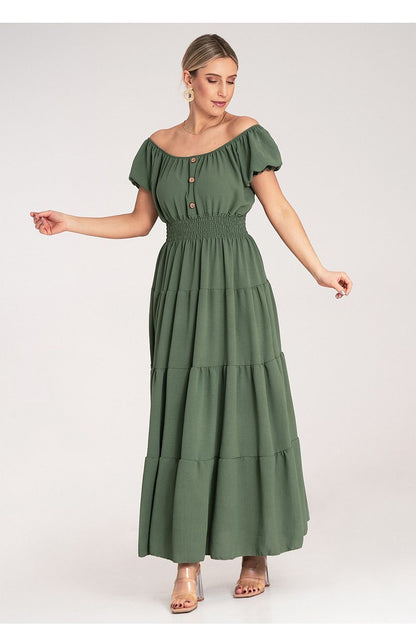 Luxury summer maxi dress from Figl featuring a Spanish neckline and elegant puff sleeves, designed with a flared silhouette. Perfect for warm weather styling.