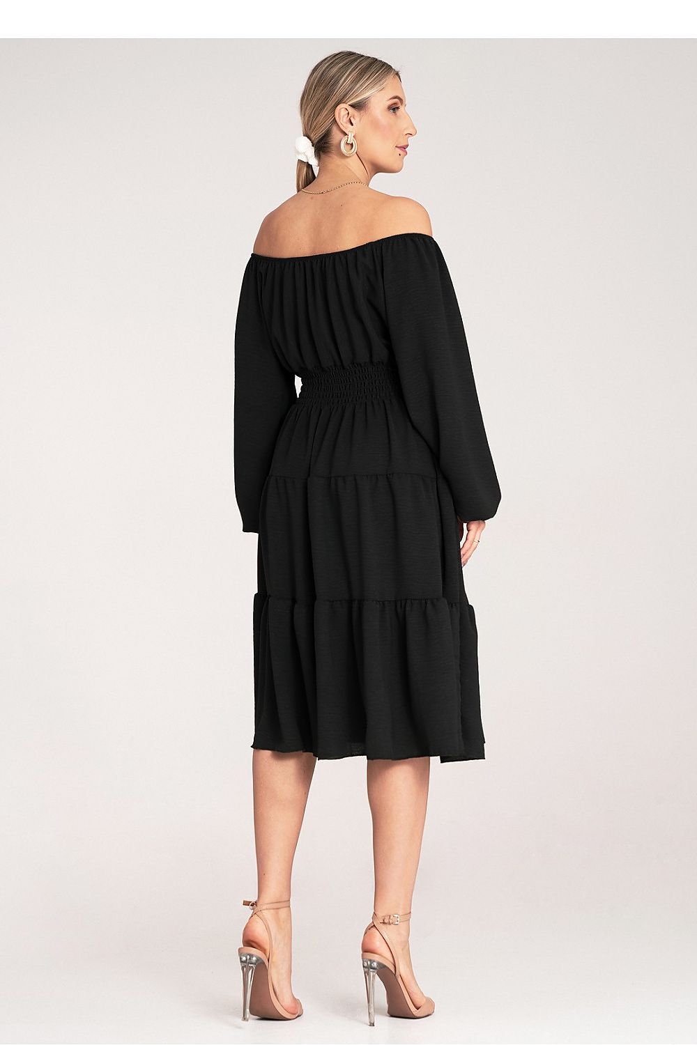 Model wearing the luxurious Figl midi dress with Spanish neckline, demonstrating the flattering fit and elastic waistband for an elegant silhouette.