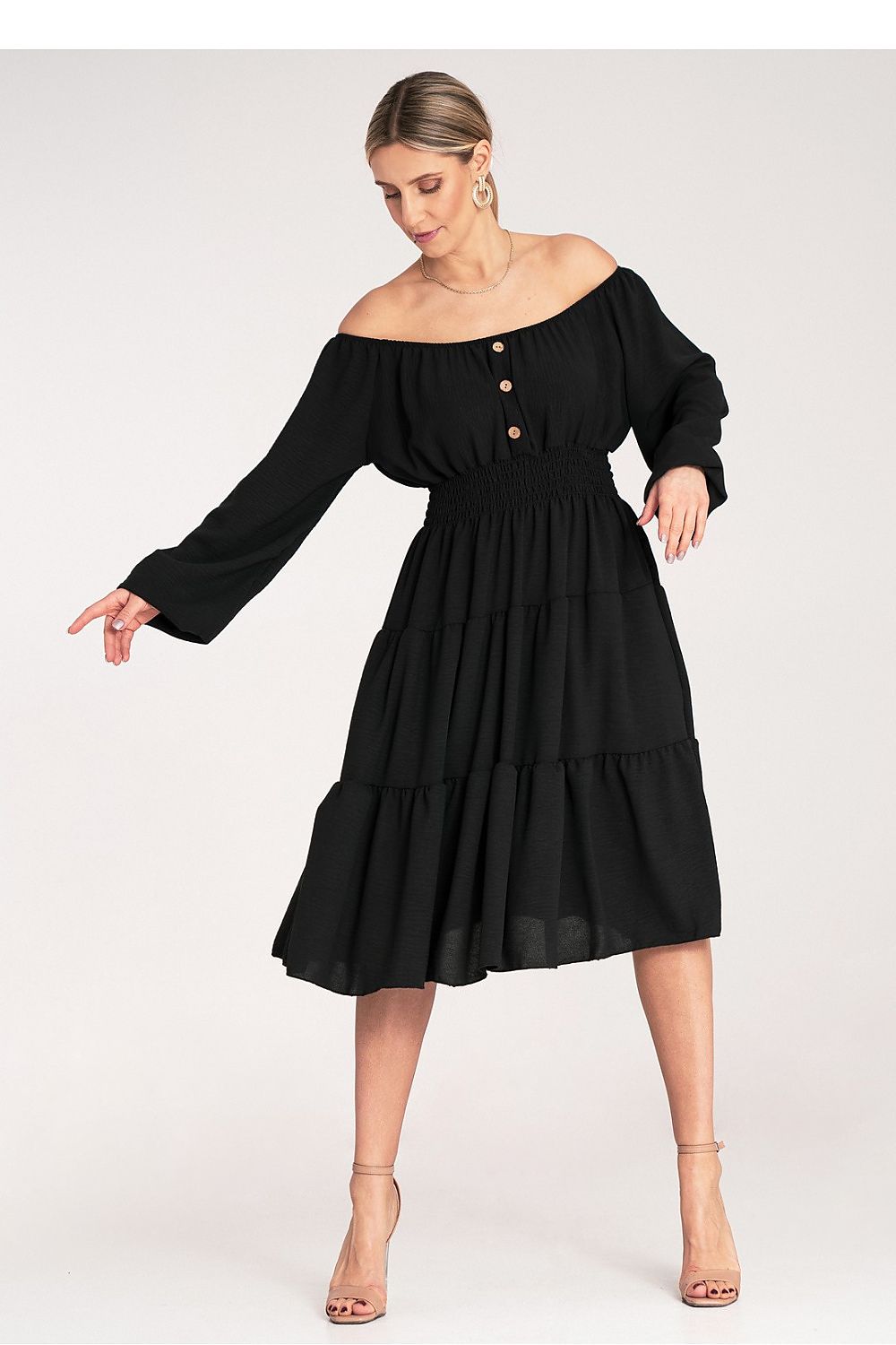 Back view of Figl's elegant midi dress, illustrating its chic design and attention to detail, suitable for a refined look at any daytime occasion.