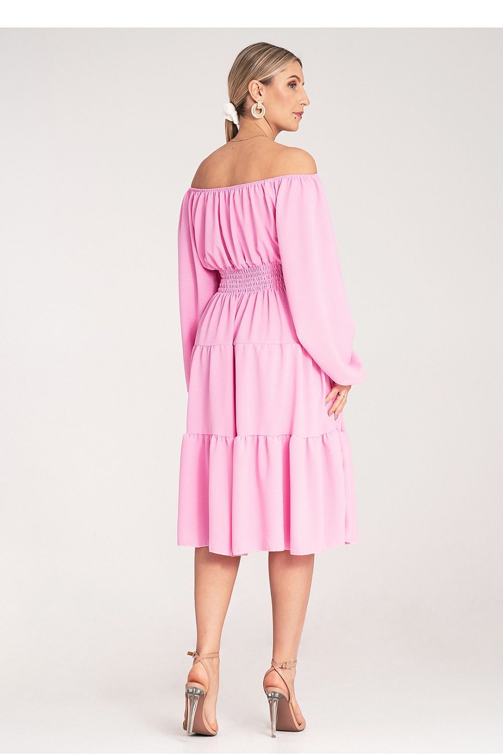 Stylish close-up of Figl's elegant midi dress showcasing the intricate ruched detailing and chic wooden buttons on a Spanish neckline, tailored for comfort and sophistication in EU size 0.