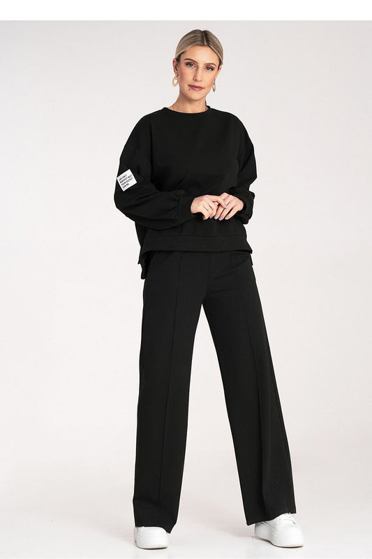 Elegant black tracksuit ensemble from Figl, showcasing a relaxed fit sweatshirt and chic wide-leg pants, ideal for lounging or casual outings.