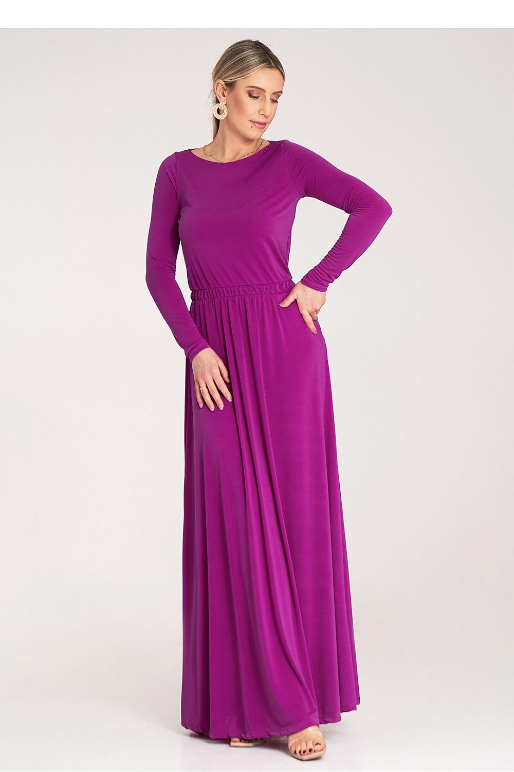 Elegant maxi dress featuring long sleeves and an elastic waist, designed by Figl. Available in sizes S to XL, perfect for a luxurious and stylish look.