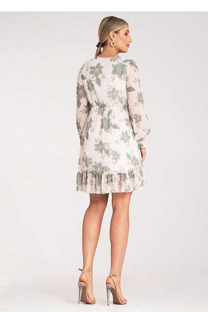 Airy Floral Midi Dress by Figl displayed on a mannequin, highlighting the feminine silhouette and elastic waist for comfort and elegance.