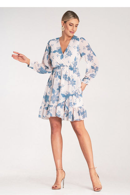 A beautifully styled Airy Floral Midi Dress by Figl, perfect for special occasions or chic casual wear, featuring a flattering fit.