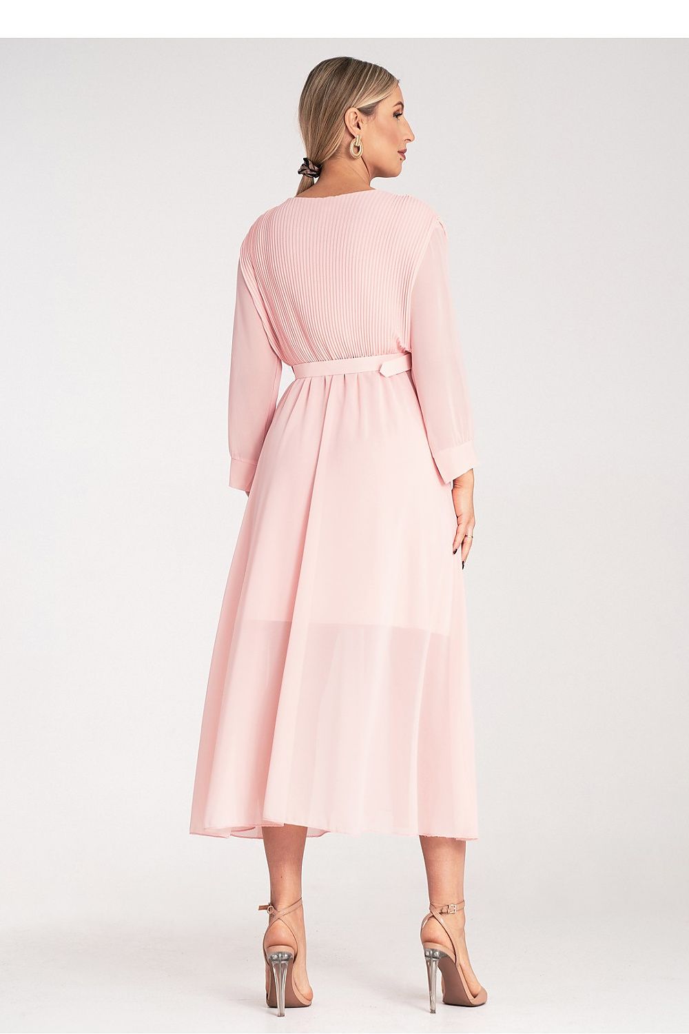 Figl elegant maxi dress displayed on model, highlighting the flattering long sleeves and belted waist for timeless sophistication.