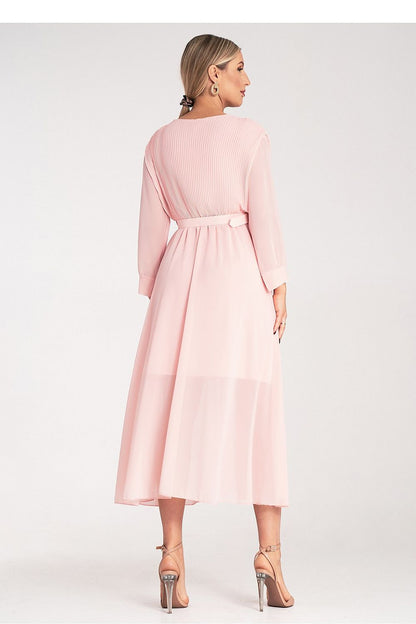 Figl elegant maxi dress displayed on model, highlighting the flattering long sleeves and belted waist for timeless sophistication.