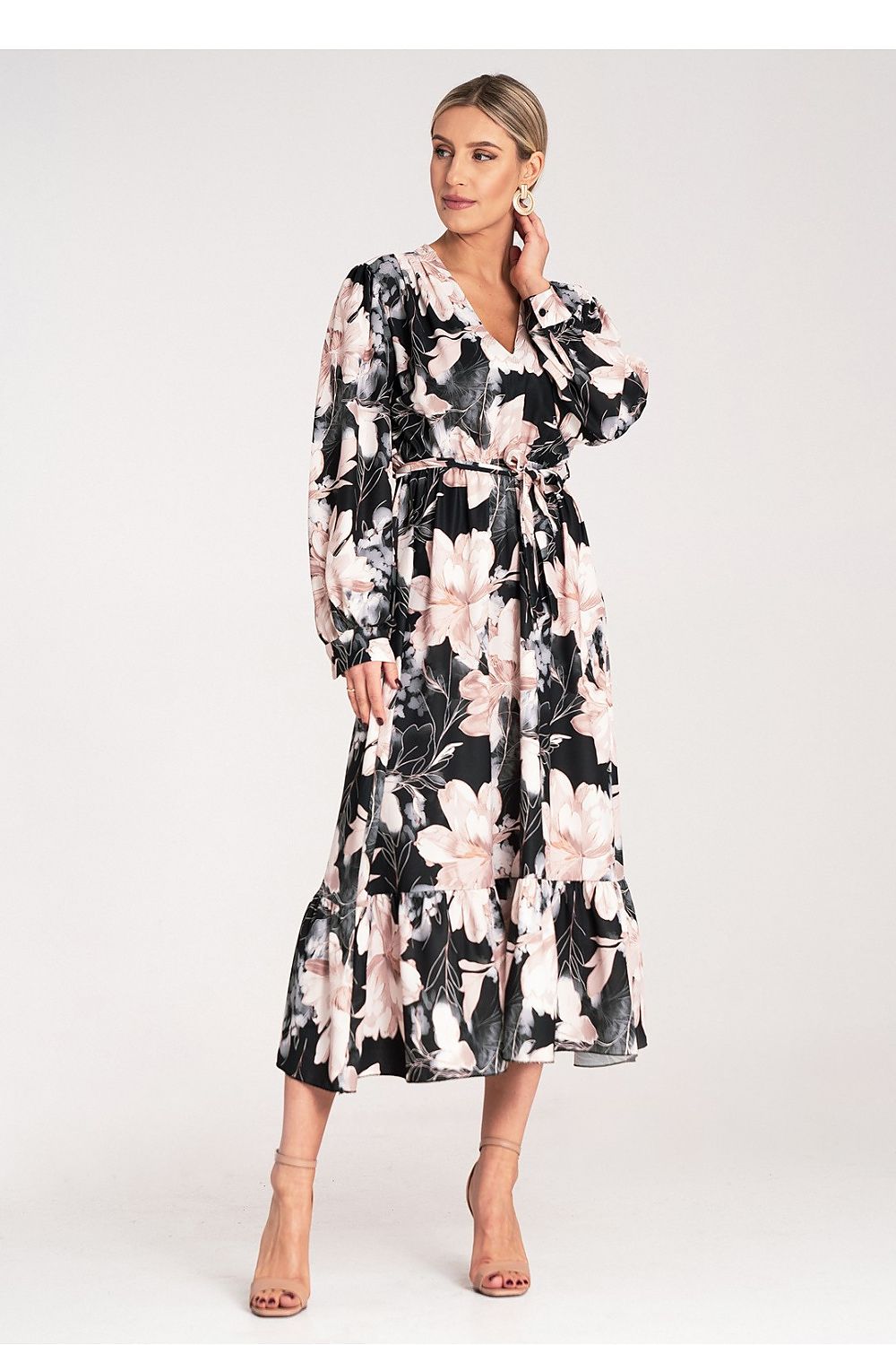 Close-up view of the floral motif on the Luxury Floral Maxi Dress by Figl, showcasing fine detailing and vibrant colours.