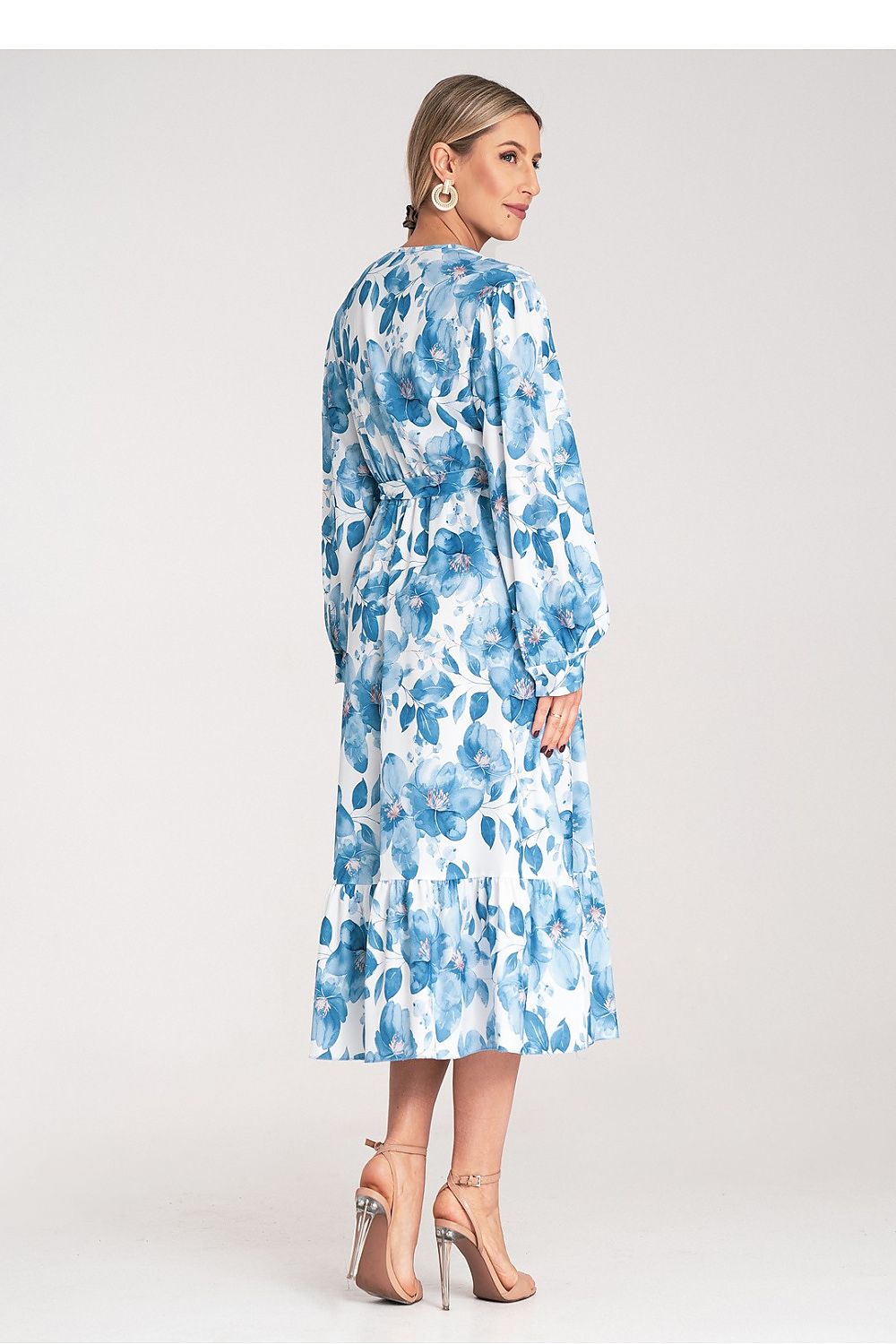Elegant Floral Maxi Dress from Figl, showcasing intricate floral motifs and a flattering ruffle hem for a luxurious look.