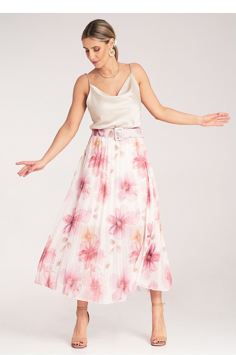 Close-up of the Floral Pleated Midi Skirt with High Waist Belt by Figl, highlighting the fine detailing and the flowing material that exudes elegance.