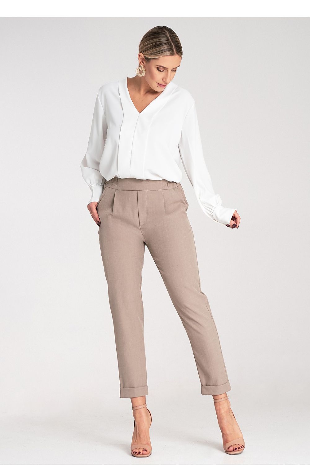 Luxurious women's trousers by Figl featuring slip pockets and a flattering silhouette ideal for elegant styling.