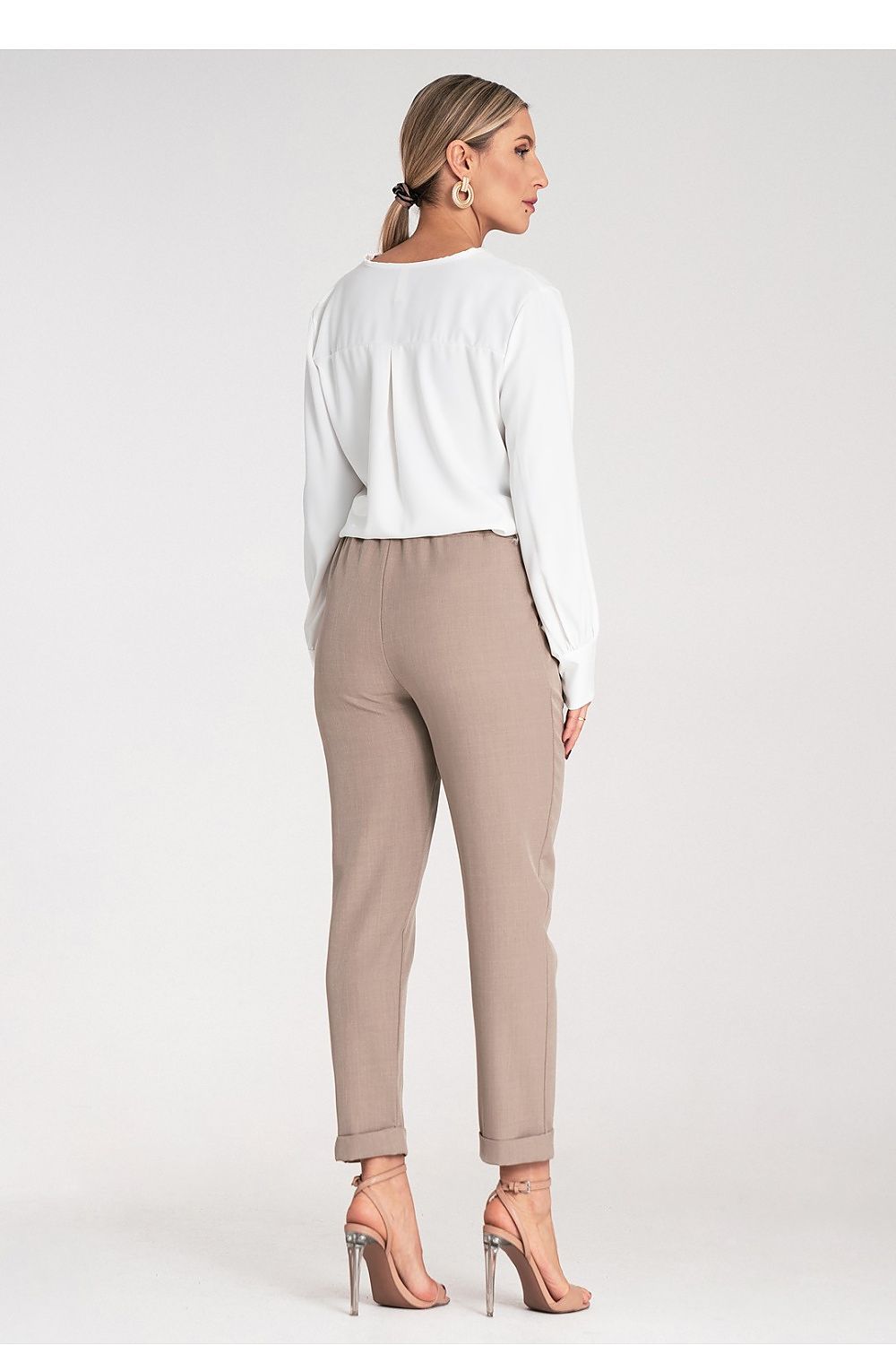 High-quality women's trousers by Figl made from 95% polyester, designed for comfort and chic elegance.