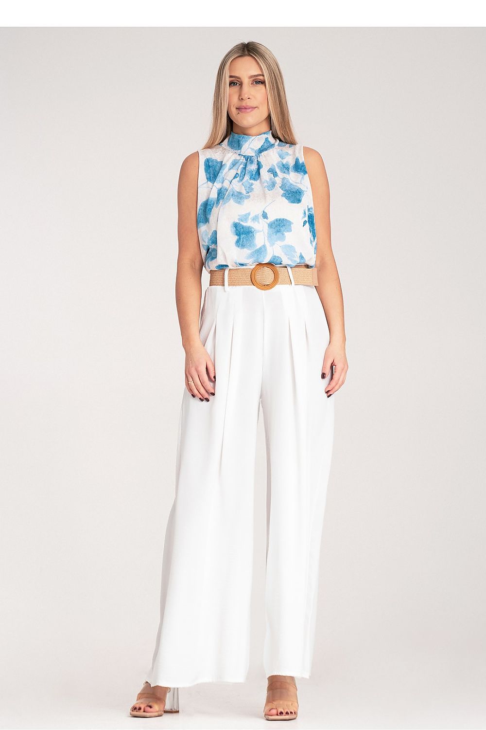 An elegant pair of wide trousers from Figl, designed with a decorative woven belt and subtle pleats for a sophisticated look.